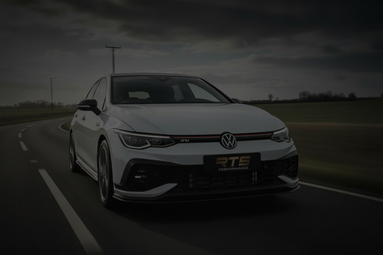 White car with black roof and RTS Performance logo on a black background